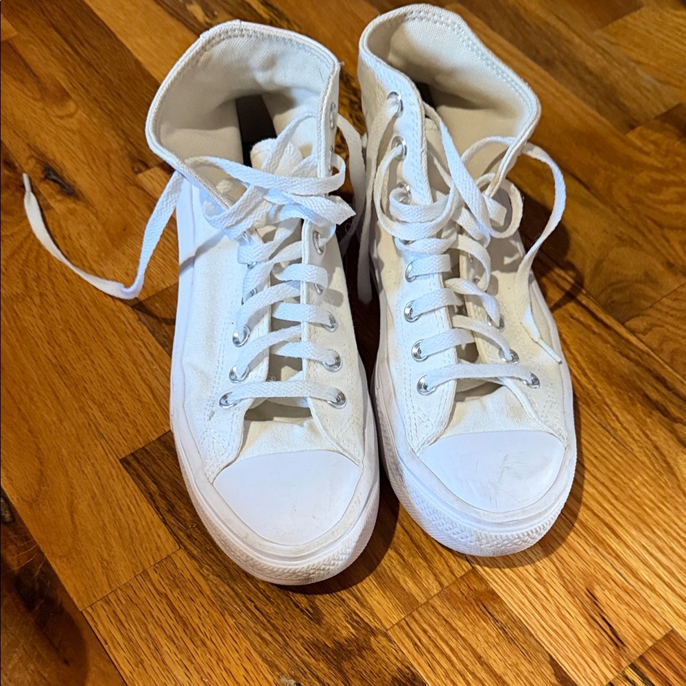 Converse Classic White Canvas High-Tops with small stain shown